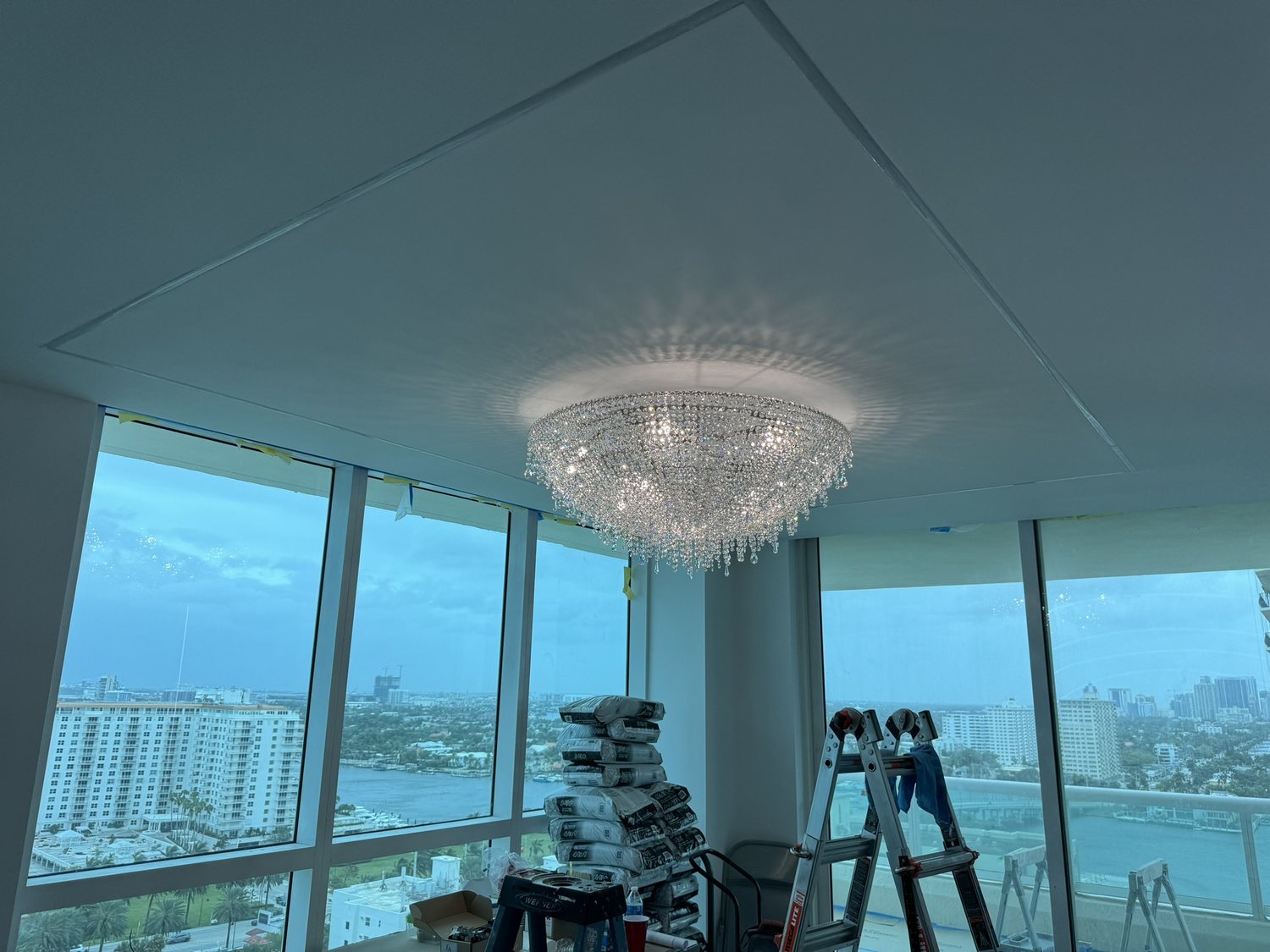 High-rise crystal install