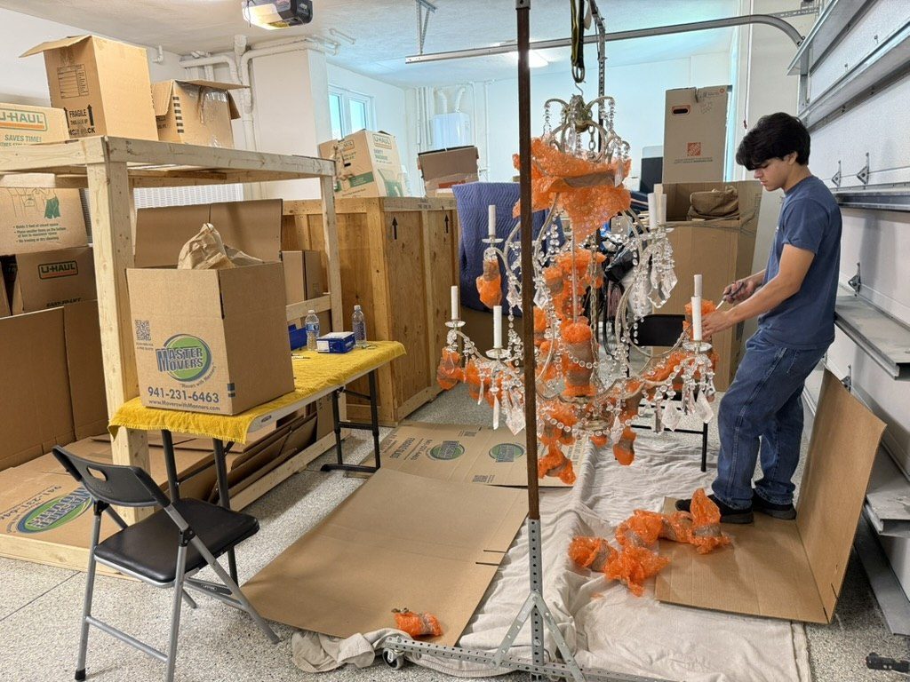 Reassembling a relocated crystal chandelier
