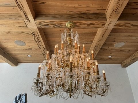 Gold crystal on a wood ceiling