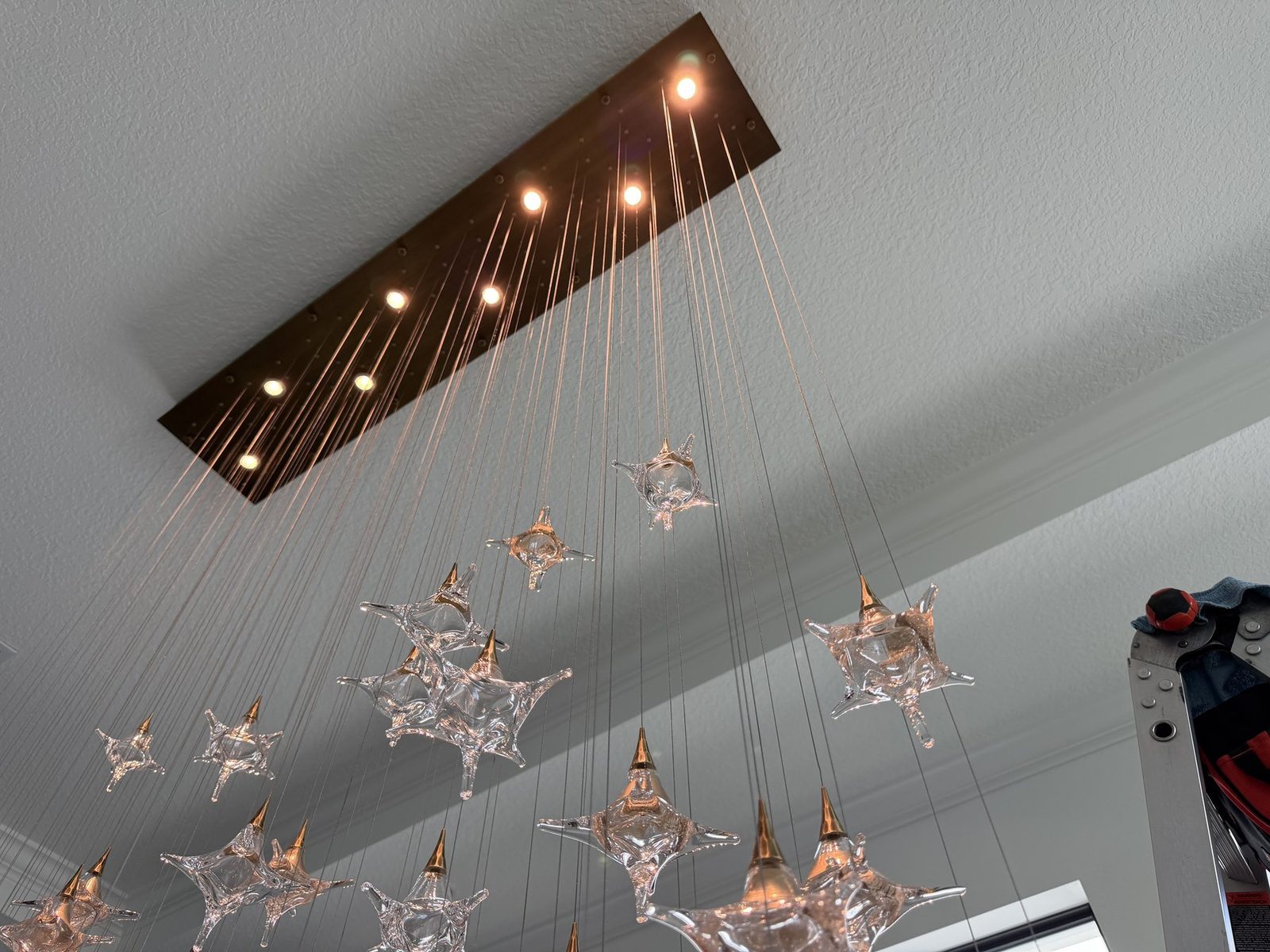 Glass-Star Cascade, residential chandelier in a Florida home