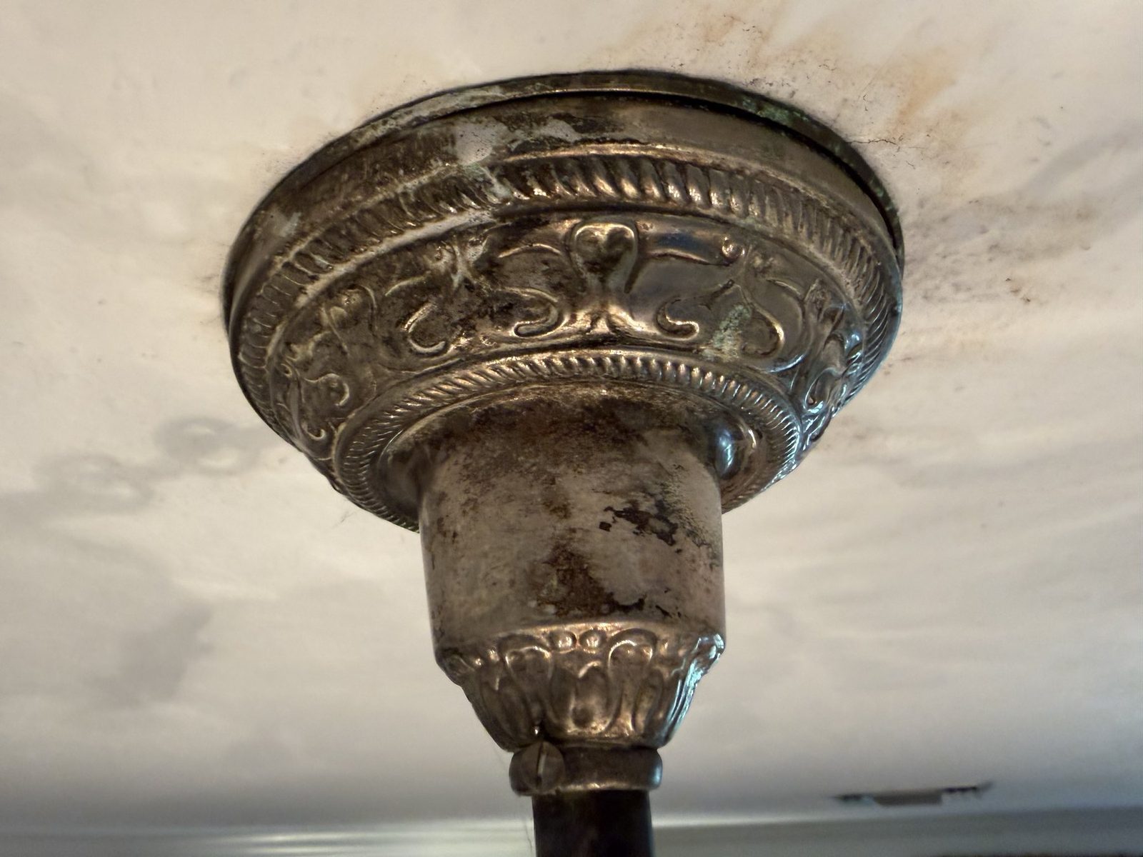 Tarnished brass, before