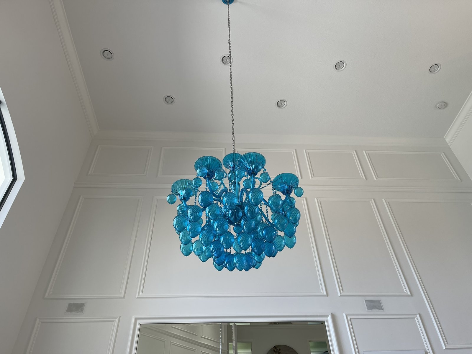 Room fully protected before chandelier cleaning begins